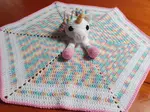 My Unicorn Lovey has proven to be quite popular.  I make two versions, one on a six sided blanket and the other on a 10 sided star blanket.