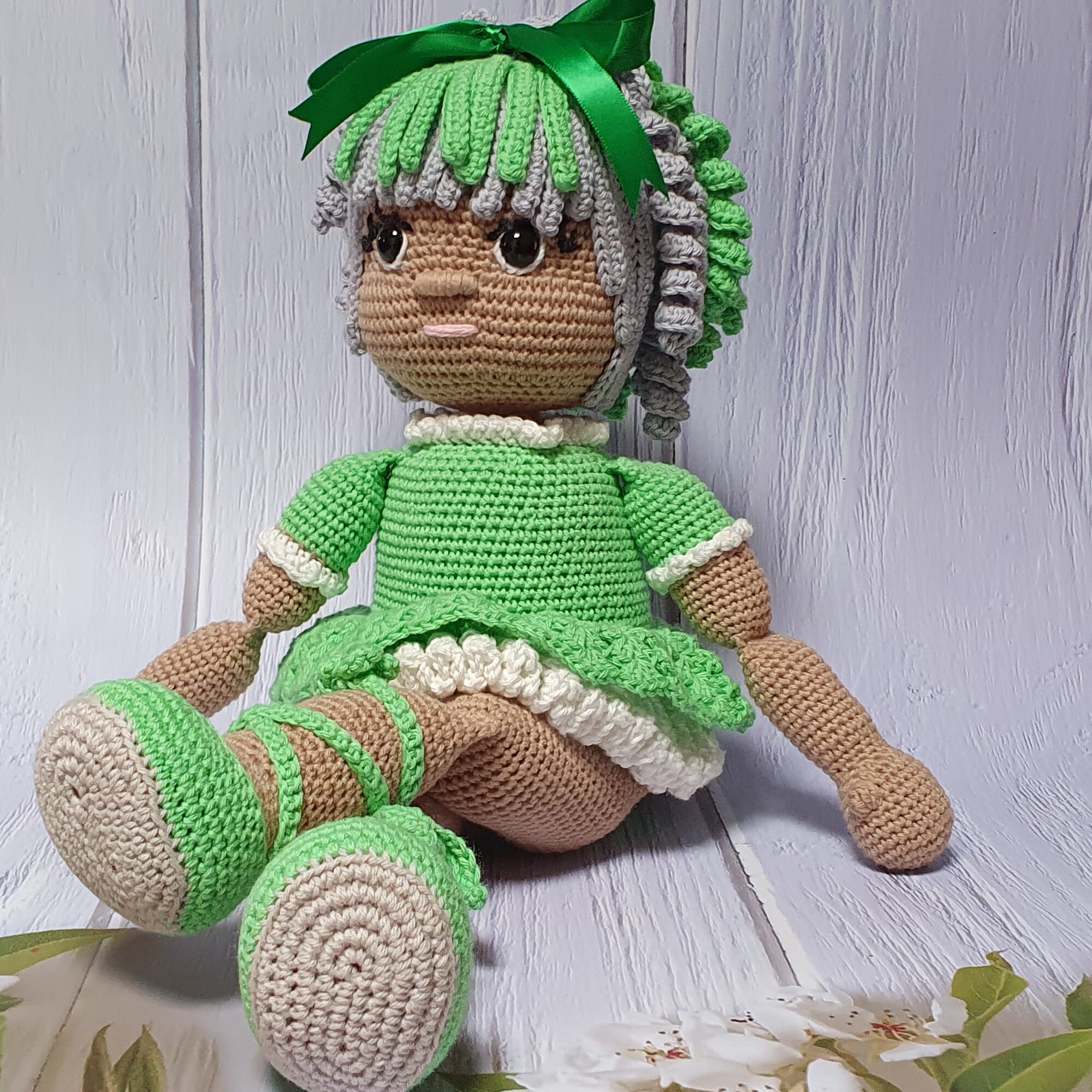 green doll